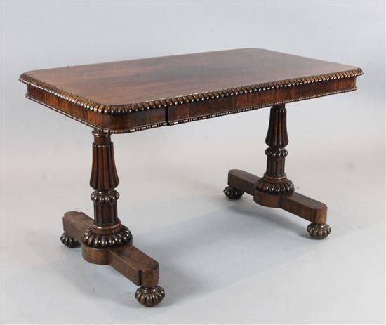 A Regency rosewood library table, W.4ft D.2ft 4in. H.2ft 5in.